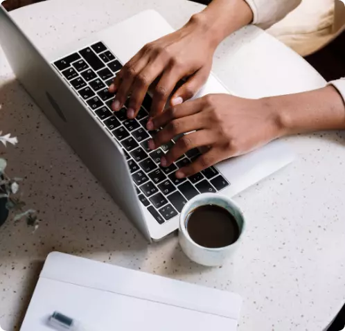 people using a laptop